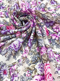 Floral patterned purple woolen shawl with peony purple flowers and pale green leaves.