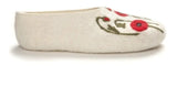 White merino wool slipper with floral poppy  embroidery on a white background