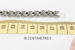 This beautiful silver 925 bracelet features deep navy blue topaz stones that add a touch of elegance to your look. The Armenian Spirit design is carefully crafted for a unique and timeless piece. Choose from a variety of lengths for a perfect fit. Perfect for formal occasions or everyday wear.