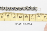 This beautiful silver 925 bracelet features deep navy blue topaz stones that add a touch of elegance to your look. The Armenian Spirit design is carefully crafted for a unique and timeless piece. Choose from a variety of lengths for a perfect fit. Perfect for formal occasions or everyday wear.