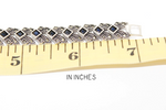 This beautiful silver 925 bracelet features deep navy blue topaz stones that add a touch of elegance to your look. The Armenian Spirit design is carefully crafted for a unique and timeless piece. Choose from a variety of lengths for a perfect fit. Perfect for formal occasions or everyday wear.