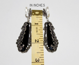 Experience the Armenian Spirit with our luxurious sterling silver earrings. These 2.5 inch long earrings feature a striking black onyx stone and sparkling marcasite, adding a touch of elegance to any outfit. Shop for the best jewelry online with our top-rated store. Our hypoallergenic sterling silver 925 guarantees no irritations. Take advantage of our discounts and free shipping with tracking on platforms like Etsy and eBay.