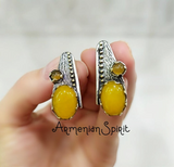 Lemon yellow gemstone earrings buy online for women who loves lemons. These lemon color cabochon jadeite earrings looks very trendy and will atrcat a lot of attention. The metal is sterling silver 925. The quantity of stones is 2 on each earrings, together 4.