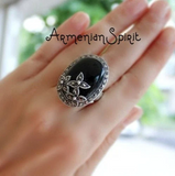 Searching for a silver ring with floral marcasites and oval black cabochon onyx? We sell rings with different types of natural gemstones. Our jewelry is one of a kind. The ring has also oval small earrings in a set.