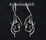 Do you like art jewelry? Don't know where to buy earrings with faces and masks? These earrings are made in the shape of two faces looking at each other. The earrings are silver and without stones, smooth and well polished to a shine. This is the perfect gift for a beautiful girl who appreciates art.