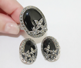 Surprise your loved ones with these elegant marcasite floral earrings and ring, featuring black onyx stones set in silver 925 and inspired by Armenian spirit. A perfect gift idea for nurses and jewelry lovers alike. Show your appreciation with these unique and stylish earrings and ring with small flowers.