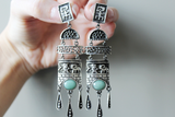 Long earrings always look impressive. If you like shoulder length earrings with dangling details and ethnic designs and patterns, then you will love these earrings. Such long earrings are a real find, especially if you need earrings with stones. We make these earrings with ar stones: jade and garnet.