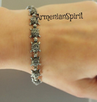 This bracelet is made of sterling silver 925 and tiny marcasite stones. The bracelet consists of small turtles, which are attached to each other in row. The tortoises look very realistic. This silver bracelet can be a wanted gift for women and men.