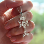 This sterling silver Armenian Spirit necklace features a delicate Armenian Apostolic cross charm, perfect for a child's baptism. The elegant chain adds a touch of timeless beauty. Made with quality craftsmanship, this cross will be a cherished piece for generations to come.