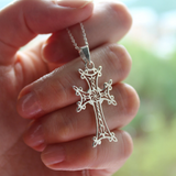 This sterling silver Armenian Spirit necklace features a delicate Armenian Apostolic cross charm, perfect for a child's baptism. The elegant chain adds a touch of timeless beauty. Made with quality craftsmanship, this cross will be a cherished piece for generations to come.