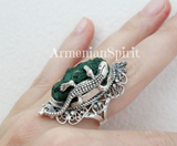 Buy velevet malachite green gemstone ring in filigree technique made of sterling silver 925. The ring is one of a kind and has a lizard reptile from the one side. The ring looks like old fashioned vintage jewelry for adult woman.