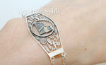 Expertly handcrafted in Armenia, this stunning bracelet is made from genuine sterling silver 925. The intricate design features traditional Armenian symbols of strength and resilience, making it the perfect gift for loved ones or as a bulk jewelry purchase. Show your Armenian pride with this Tatik papik bracelet.