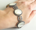 Add a touch of luxury to your style with our Bracelet Sterling Silver 925 Sadaf Gems Armenian Spirit. Crafted with large oval flat beige sadaf nacreous gems, this royal jewelry piece exudes the best in Armenian design. Perfect for any rich woman, this bracelet makes for a beautiful gift.