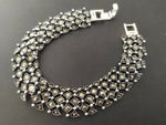 This luxurious wide women's bracelet is made of sterling silver 925 and features beautiful marcasite stones. Its chunky design is perfect for both everyday wear and special occasions. Available in various lengths, it makes for a stylish and thoughtful gift for a wife or girlfriend. Elevate your accessory game with this stunning piece from our collection.