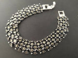 This luxurious wide women's bracelet is made of sterling silver 925 and features beautiful marcasite stones. Its chunky design is perfect for both everyday wear and special occasions. Available in various lengths, it makes for a stylish and thoughtful gift for a wife or girlfriend. Elevate your accessory game with this stunning piece from our collection.