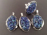 Jewelry set earrings, ring and pendant with lapis lazuli blue gemstones. The jewelry is completely handcrafted and the design is unique.