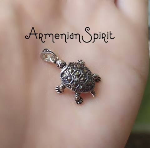 This tiny silver turtle pendant, adorned with marcasite, is a beautiful addition to any jewelry collection. Not only is it a symbol of luck, but its unique design will make a statement. Buy one for yourself or give it as a gift to someone special.Upgrade your jewelry collection with our high quality sterling silver pieces. Each item is stamped with 925 for authenticity and comes with free shipping and tracking. Perfect for those with sensitive skin. Elevate your style with ease.