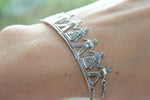 Inspired by Armenian folk dances, our jewelers made a line of silver jewelry with men and women in Armenian national folklore costumes Taraz. We make silver bracelets, rings, earrings and pendants with people dancing folklore dances. This silver bracelet is also from the traditional dance series. The bracelet itself consists of an arc and a chain, which allows you to adjust the length of the bracelet.