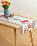 Easily elevate your home decor with our Gray Pink Poppy Table Runner. Made from 100% cotton, this runner is perfect for adding a touch of charm to your kitchen or living room. With a beautiful poppy design, it makes a great gift idea and can be purchased in bulk for your convenience. Shop online now!