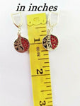 What is the meaning of Pomegranate tree in Armenian culture?In Armenian tradition, the pomegranate tree acts as a symbol of life, prosperity and marriage, as well as prosperity and fertility, because pomegranate trees give their fruits all year round. These earrings are made in a shape of pomegranate. The half of a pomegranate has a pattern of pomegranate tree - tree of life. The red zircon stones symbolize the pomegranate red seeds.