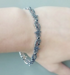 Another masterpiece from Armenian jewelers is a beautiful delicate bracelet made of silver and black onyx with delicate small flowers, which will look simply magnificent on any woman’s wrist. The bracelet is also decorated with small marcasite stones, which add sparkle and sparkle to the silver jewelry.