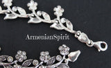 This exquisite bracelet, adorned with sparkling white zircon stones, is the perfect accessory for any special occasion. With its elegant design and high-quality 925 silver, it is sure to catch the eye and add a touch of Armenian spirit to any ensemble. Perfect for weddings, bridal parties, and other special events.