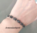 Enhance your style with our Tortoise Armenian Spirit silver bracelet! Made with 925 sterling silver and adorned with marcasite stones, this beautiful turtle-inspired piece is perfect for any occasion. Choose your desired length for a personalized fit. Add a touch of elegance and nature to your look.