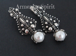 Magnificent earrings made of silver 925 and white pearl small gemstones. These earrings are the best gift for a bride and they will fit to any wedding dress classy of fashionable. These pearl earrings are also trendy and they will fit with white outfit or caual style clothes.