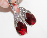 If you love beautiful bright jewelry, you will love these earrings made in vintage Armenian style. The earrings are made of 925 silver with Marcasite and Red Topaz. These earrings looks cassy in a shape of drop with dark wine red oval gemstone. The style is Royal jewelry for midevial cosplay. 