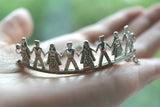 This sterling silver bracelet features intricately crafted Qochari Armenian dancers, making it perfect for men and women. Made with 925 silver, it exudes elegance and sophistication while showcasing Armenian spirit. Elevate your style with this unique and timeless piece.