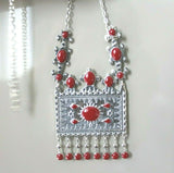 Buy Armenian large traditonal row necklace taraz tradtional jewelry silver 925. The rectangle pendant is large and has red details with Armenian national ornaments. The necklace pendant will suit well with Armenian women tradtional outfit dress and apron in red,blue, green colors.