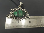 2 inch x 2 inch sterling silver pendant with oval malachite gem