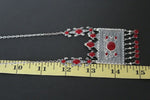 Buy Armenian large traditonal row necklace taraz tradtional jewelry silver 925. The rectangle pendant is large and has red details with Armenian national ornaments. The necklace pendant will suit well with Armenian women tradtional outfit dress and apron in red,blue, green colors.