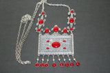 Buy Armenian large traditonal row necklace taraz tradtional jewelry silver 925. The rectangle pendant is large and has red details with Armenian national ornaments. The necklace pendant will suit well with Armenian women tradtional outfit dress and apron in red,blue, green colors.