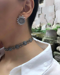 Add an elegant touch to your outfit with our high quality, Armenian handmade choker necklace. Crafted from sterling silver 925, this snug neck choker features a beautiful ethnic pattern, making it a precious addition to your jewelry collection. Complete your outfit with our high-quality, handmade jewelry from Armenia. Made from sterling silver 925, this collar with tight neck closure is adorned with beautiful coins to add a unique touch to your style. Elevate taraz look with our Armenian jewelry today.



