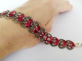 Indulge in this chic and unique Bracelet showcasing traditional Armenian craftsmanship. Made from luxurious Sterling Silver 925, it adds the perfect touch of elegance to any outfit. Its rich red color makes it a perfect accessory for weddings, special occasions, or everyday wear. A stunning gift for any occasion.