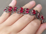 Indulge in luxury with our red Sterling silver 925 "Armenian Spirit" bracelet. Perfectly crafted from precious metal, this chic and unique accessory adds a rich touch to your wardrobe. Perfect for weddings and special occasions, it is the perfect match for red dresses and coats. Elevate your style with this must-have piece.