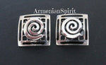 Buy handmade Armenian jewelry large earrings with Armenian eternity arevakhach symbol. The jewelry has unique artisan design.