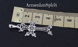 Armenian Apostolic body cross jewelry made from sterling silver in khachkar design with eight points and Armenian eternity wheel sign near a ruler and title Armenian Spirit.