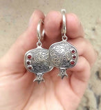 Buy Armenian pomegranate earrings with red garnet gemstones and English lock with herbal pattern in ethnic style.