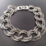 Elevate your style with this luxurious Sterling silver 925 marcasite bracelet. With large links and a chic Armenian Spirit design, this bracelet is perfect for any jewelry lover. Give the gift of elegance and modernity to the special woman in your life with this stylish and unique piece. Shop now on ebay and etsy.