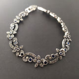 This Armenian Spirit bracelet is a modest yet chic gift for mom this Christmas. Made of Sterling silver 925, it exudes elegance with a touch of the vibrant blue spirit of Armenia. Give the gift of style and culture with this unique piece. Shop now on etsy and get discounts. Rare finds on best silver jewelry store on etsy.