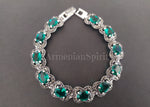 This stunning Sterling Silver bracelet features large emerald green gemstones, representing the majestic spirit of Armenia. A perfect gift for any special occasion, this bracelet is available in our Etsy and Shopify shops, with free shipping to Saudi Arabia, Europe, the Emirates, USA, and other countries. Elevate your jewelry collection with this beautiful piece.