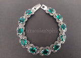 This stunning Sterling Silver bracelet features large emerald green gemstones, representing the majestic spirit of Armenia. A perfect gift for any special occasion, this bracelet is available in our Etsy and Shopify shops, with free shipping to Saudi Arabia, Europe, the Emirates, USA, and other countries. Elevate your jewelry collection with this beautiful piece.