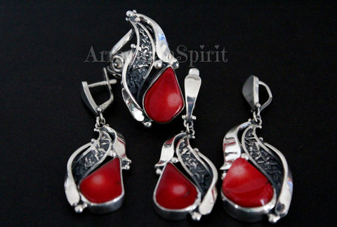 Buy handcrafted jewelry artisan design with contemrorary pattern and coral red gemstones natural. The jewelry set included big pendant, large ring and long earrings. The jewelry set will look perfect with red and black dress in any season, winter, summer, spring or autumn. These earrings, ring and pendant are the best gift for one of a kind jewelry lover.