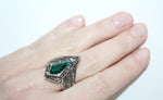 For lovers of emerald green gemstones. This ring is pointed and made of silver 925. The ring is very elegant and all sizes available from smallest finer size to biggest 12 US.