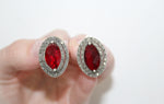 These vintage-style Armenian Spirit Small earrings add a touch of elegance to any outfit. Made of sterling silver 925, the small size makes them perfect for everyday wear. The intricate design paired with a stunning red stone creates a unique and timeless piece of jewelry. Elevate your style with these beautiful marcasite earrings.