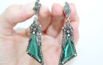 Buy earrings with bows and emerald green gemstones