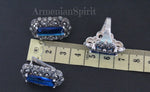 Don’t know where to buy jewelry with marcasites made of silver and blue topaz stone? This set looks absolutely gorgeous. The set includes a ring and earrings in a rectangular shape with a bright blue stone and small sparkling marcasites. This jewelry will go well with a blue cocktail dress, blouse or coat. Blue topaz stone will highlight the blue color of your eyes.