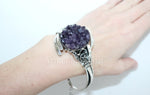 Discover the beauty and craftsmanship of Armenian jewelry with our Sterling Silver Bracelet. Adorned with a large, drusy amethyst gemstone, this artisan-designed piece exudes elegance and luxury. Made with 925 silver, the cuff style makes it easy to wear and perfect for any occasion. Elevate your style with the spirit of Armenia.